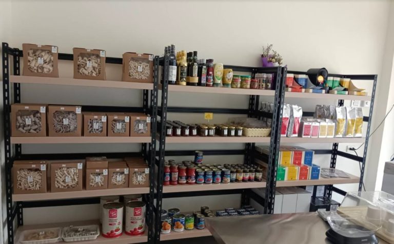 Bella fresca Cannabis dispensary shop artesans grocery shop inside racks 768x476